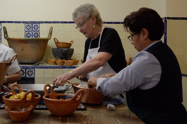 Marie frying peppers