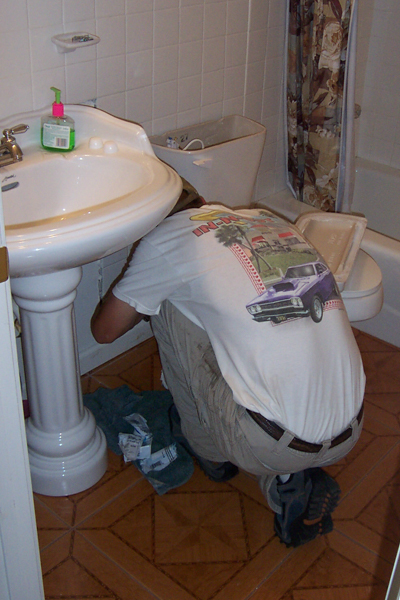 Aaron working in the bathroom